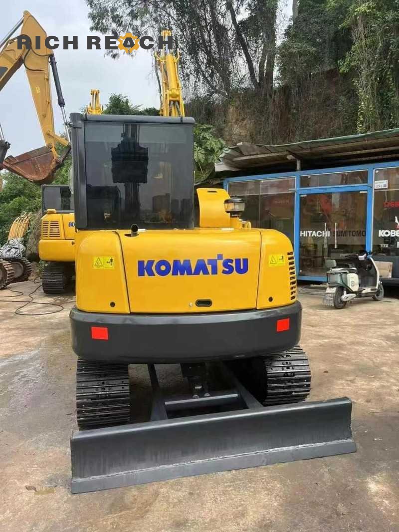 Rear view of a 2017 Komatsu PC56-7 excavator with 1,900 hours, listed for $11,111